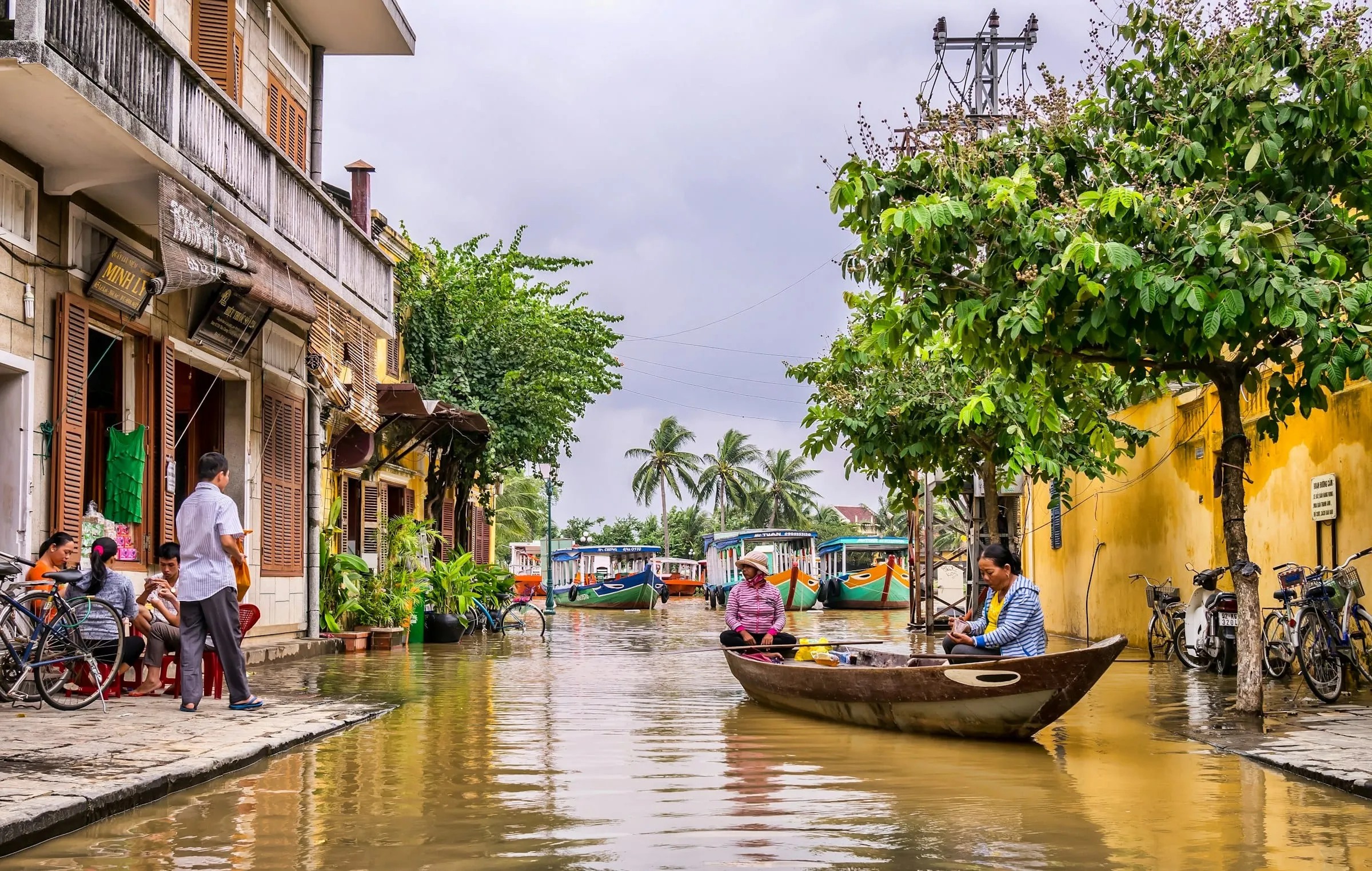A boat on a flooded street in Hoi An during rainy season