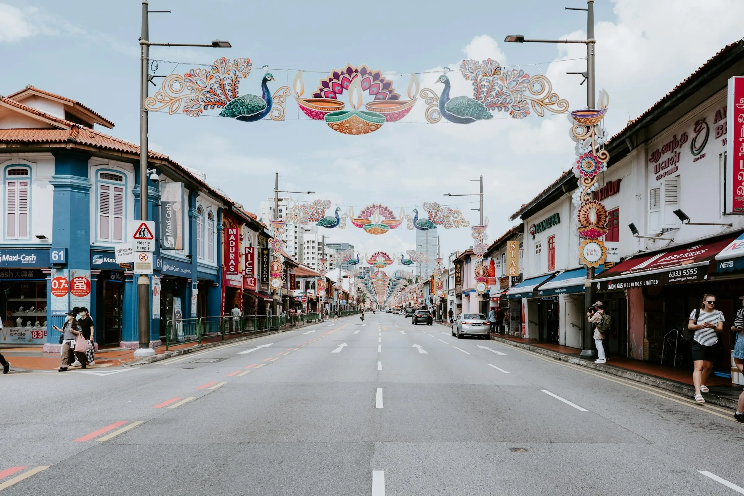 Shophouses and festive street decorations along a road in Little India, Singapore