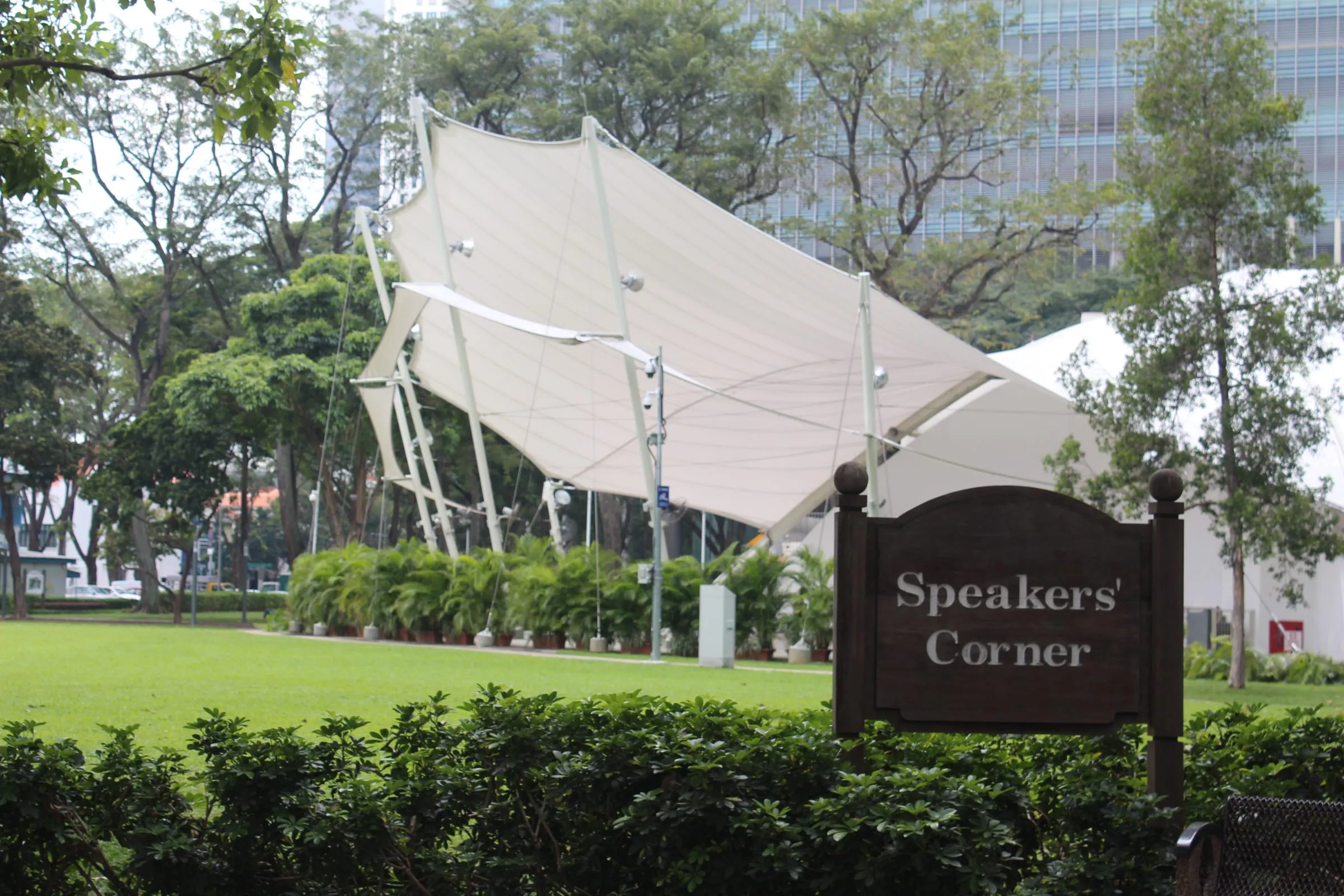The Speakers' Corner sign and a canopy stage in Hong Lim Park, Singapore