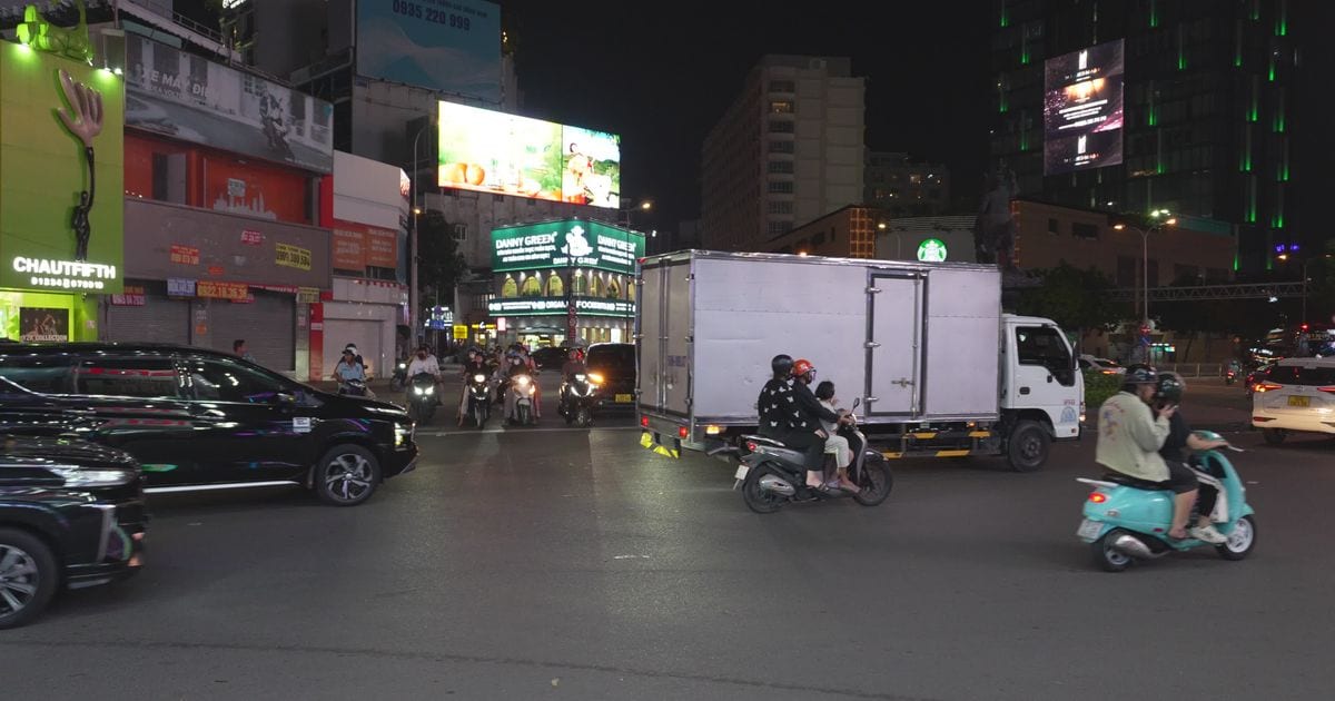 Night traffic at a busy intersection in Ho Chi Minh City